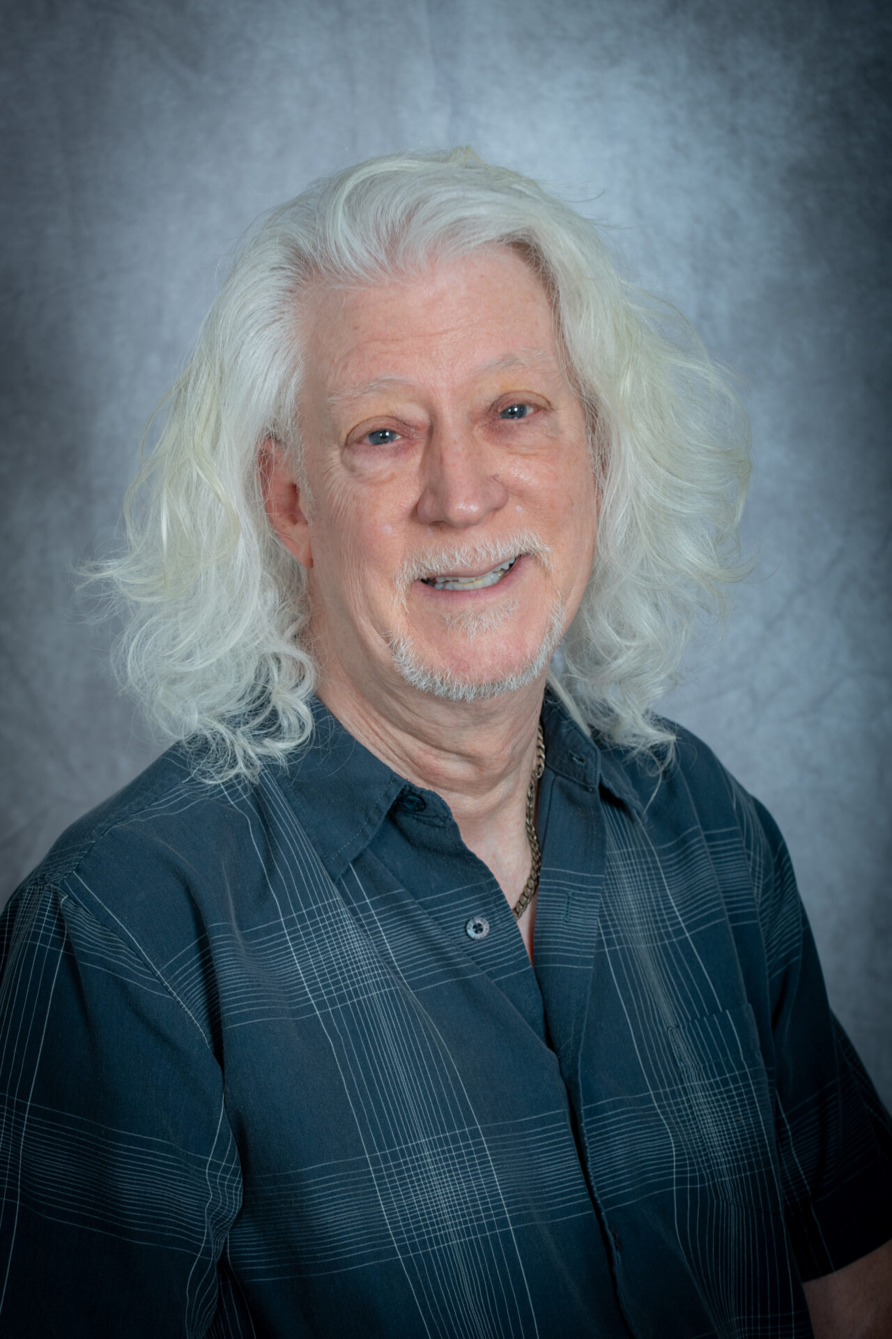 white haired male head shot